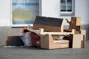 House clearance professionals removing large furniture items